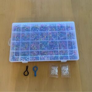 CASE FULL OF RUBBER LOOPS TO MAKE BRACELETS